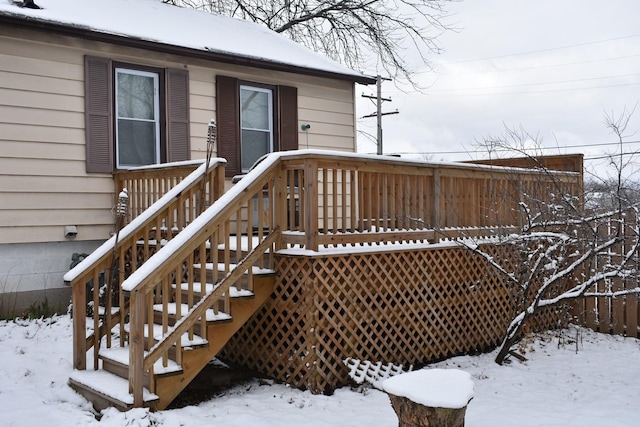 view of snow covered deck