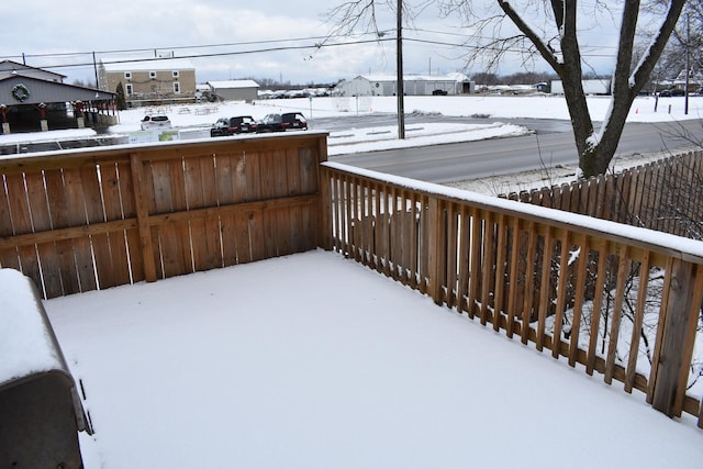 view of snow covered deck