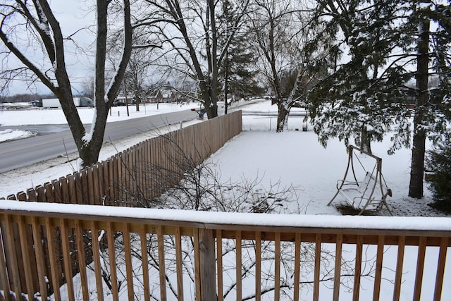 view of yard covered in snow