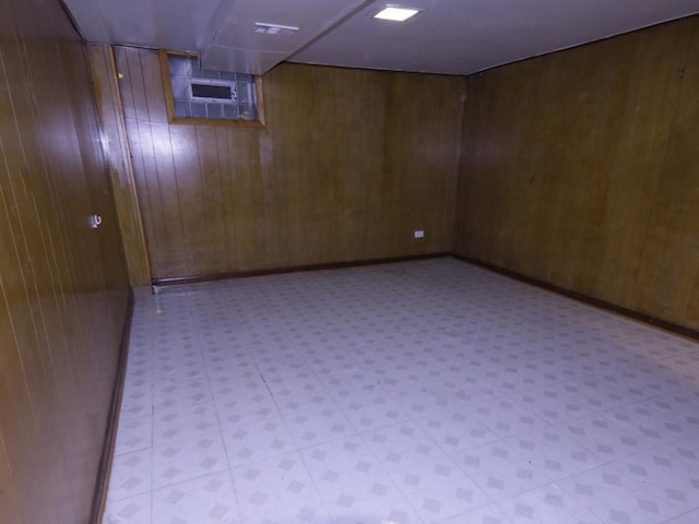 basement with wood walls