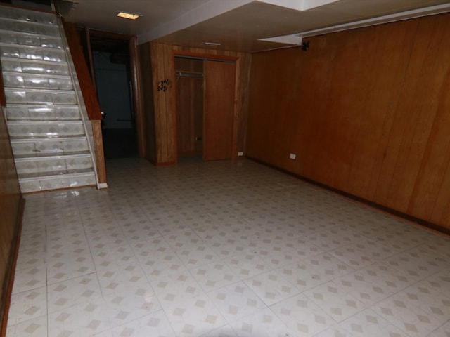 basement with wood walls