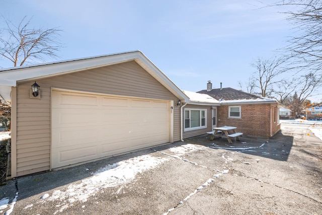 exterior space featuring a garage