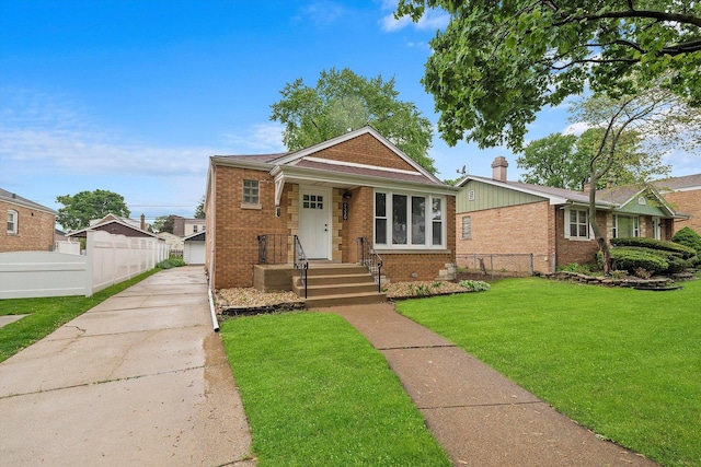 view of front of property with a front lawn