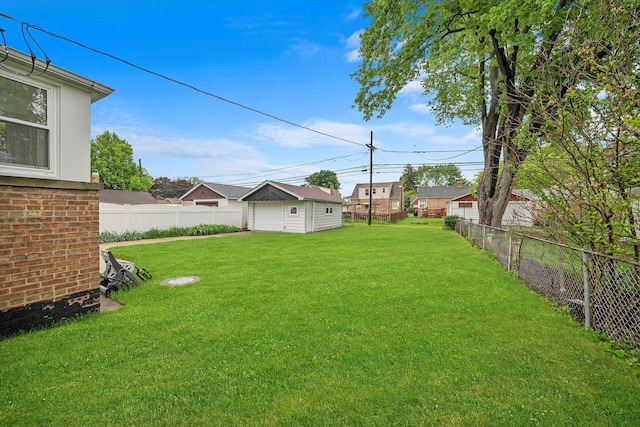 view of yard with an outdoor structure