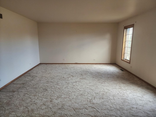 view of carpeted spare room