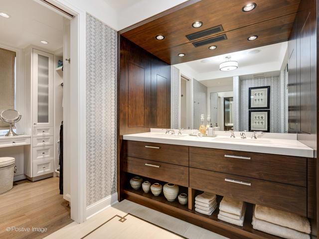 bathroom featuring hardwood / wood-style floors and vanity