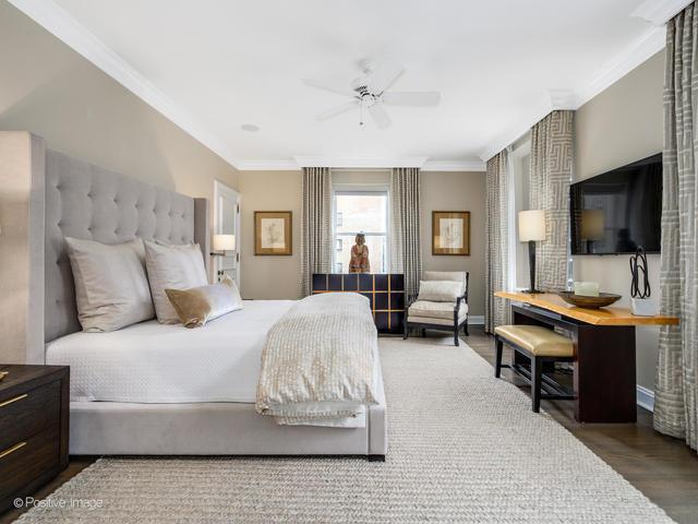 bedroom featuring ceiling fan, wood-type flooring, and crown molding