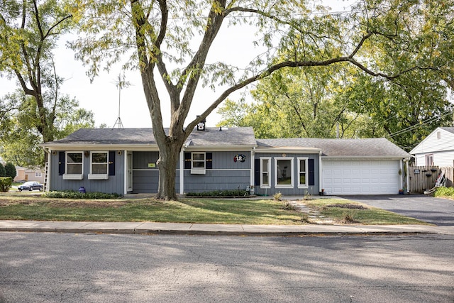 ranch-style home with a garage