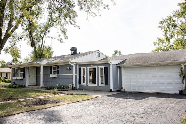 single story home with a garage