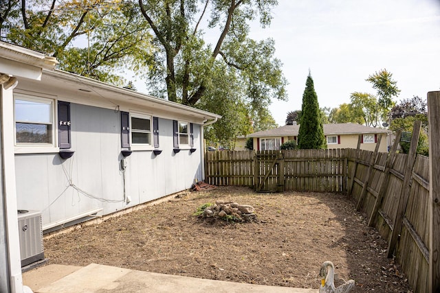 view of yard featuring central AC unit