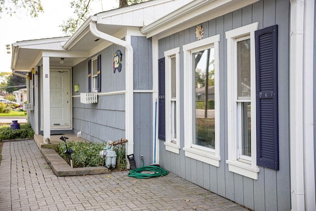 doorway to property with a patio area