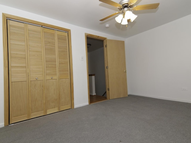 7251 S Ridgeland Ave Unit E, Chicago, IL 60649 - unfurnished bedroom with a closet, carpet, and ceiling fan