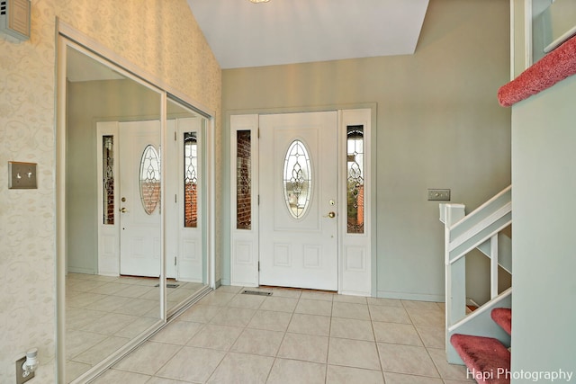 entrance foyer featuring light tile patterned floors