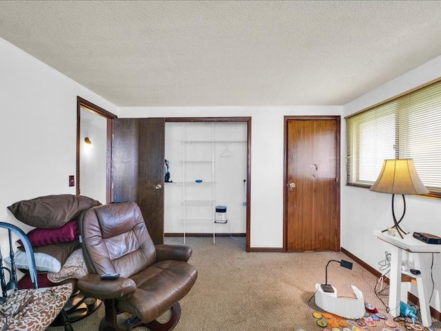 living room with light carpet and a textured ceiling