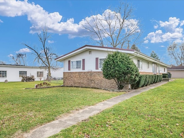 exterior space with a lawn