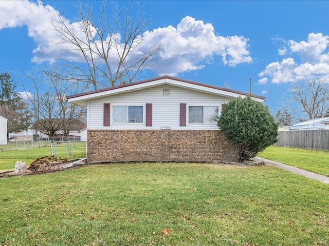 exterior space with a front lawn