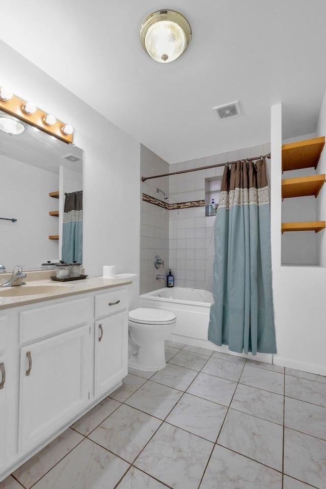 full bathroom with vanity, toilet, and shower / bath combo with shower curtain