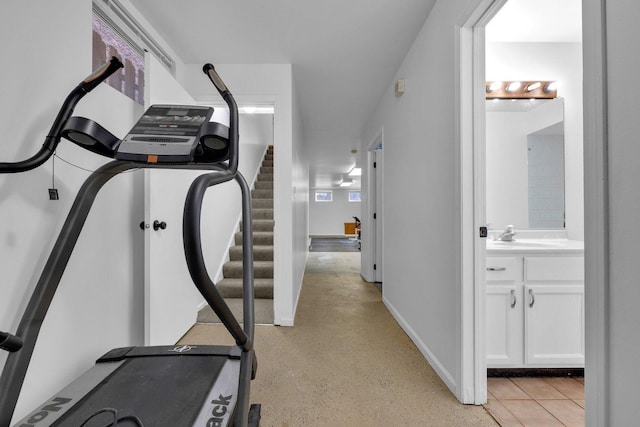 workout room featuring sink