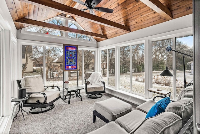 sunroom / solarium with wood ceiling, ceiling fan, lofted ceiling with beams, and a wealth of natural light