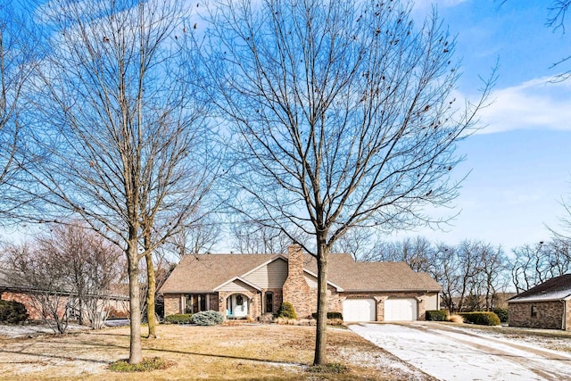 view of front of property with a garage