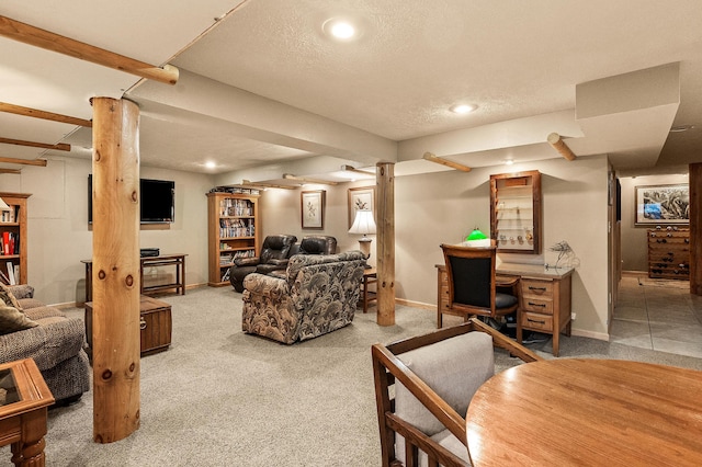 living room featuring carpet flooring and a textured ceiling