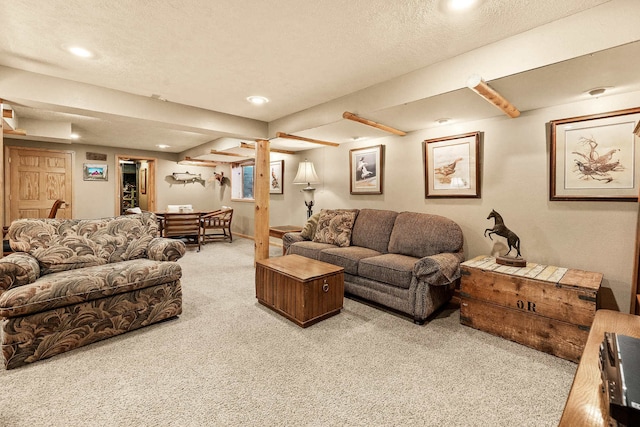 living room featuring light carpet and a textured ceiling