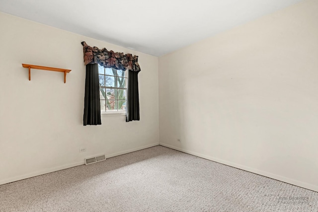 view of carpeted spare room