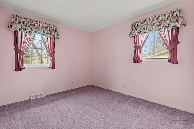 view of carpeted spare room