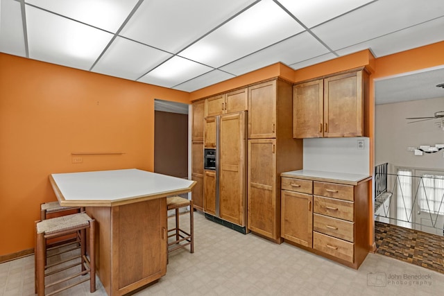 kitchen featuring a breakfast bar and a center island