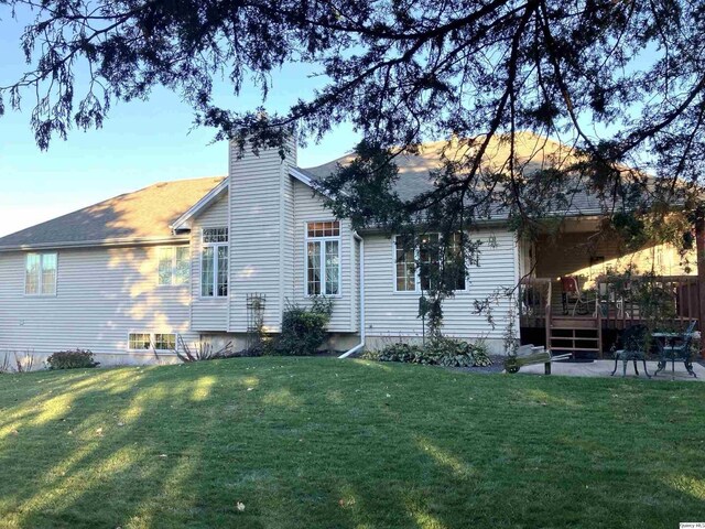 view of home's exterior featuring a yard