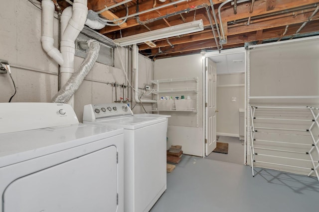 laundry room featuring separate washer and dryer