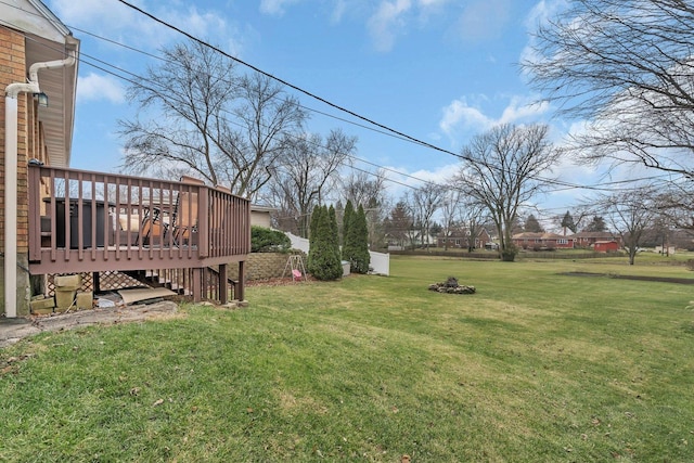 view of yard with a deck