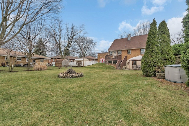 view of yard with a gazebo and a deck