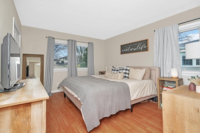 bedroom featuring wood-type flooring