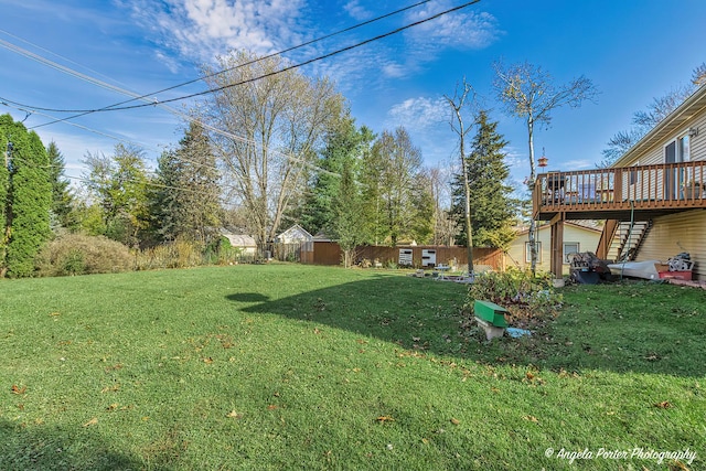 view of yard with a deck