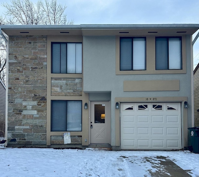 view of front of property featuring a garage