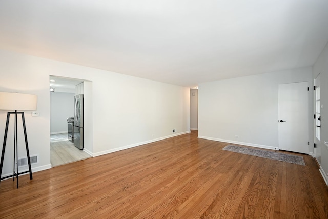 empty room featuring light hardwood / wood-style floors