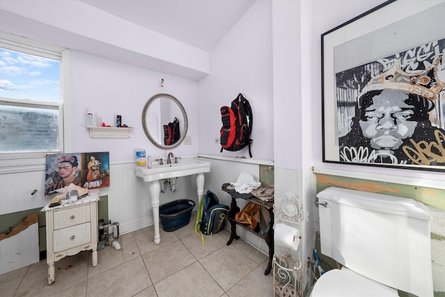 bathroom featuring tile patterned floors, toilet, and sink