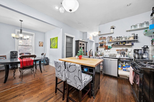 kitchen with stainless steel dishwasher, a notable chandelier, black gas stove, and dark wood-type flooring