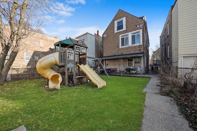 view of jungle gym with a yard