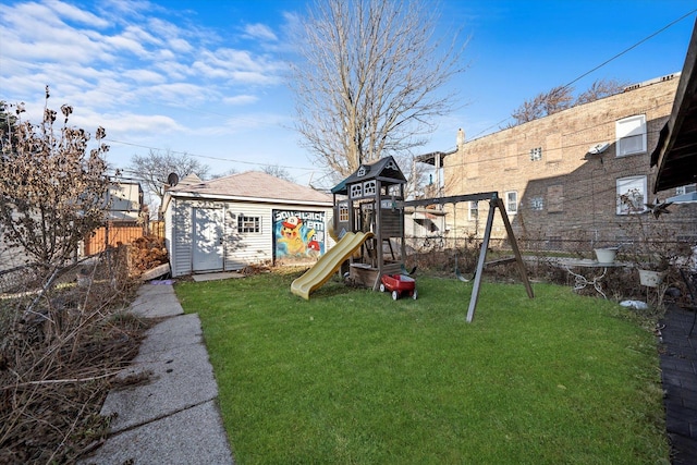 view of yard with an outbuilding and a playground