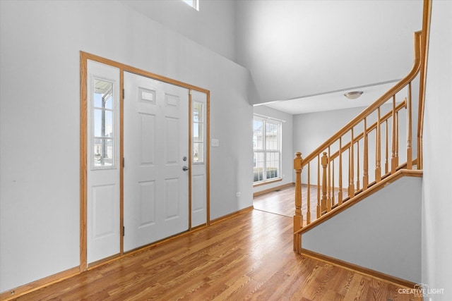 entryway with light hardwood / wood-style floors