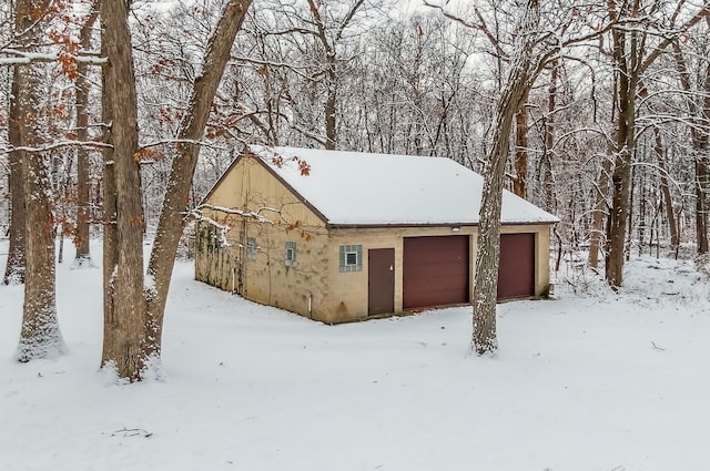 1903 Richton Rd, Steger, IL 60475 - snow covered garage with a detached garage