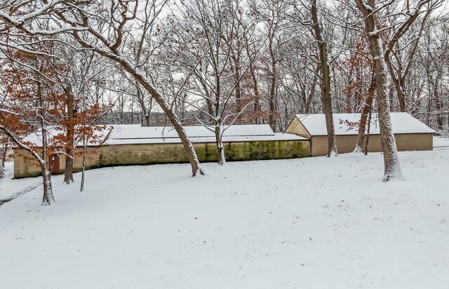 view of snow covered garage