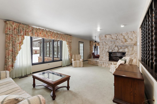 living room with a fireplace and light colored carpet