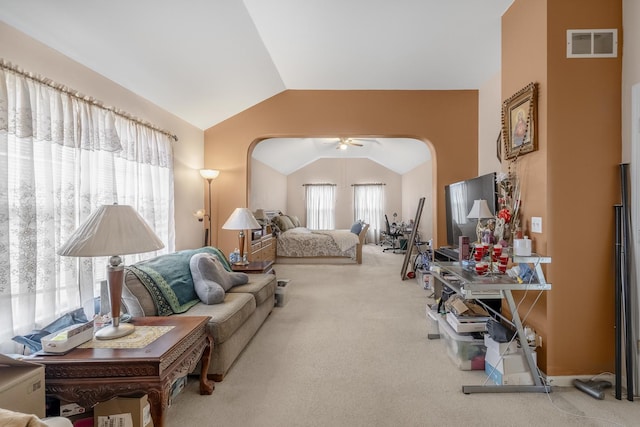 bedroom featuring carpet and vaulted ceiling