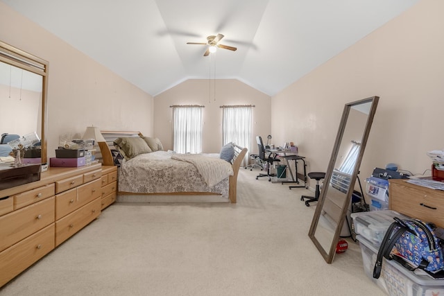 carpeted bedroom featuring ceiling fan and lofted ceiling