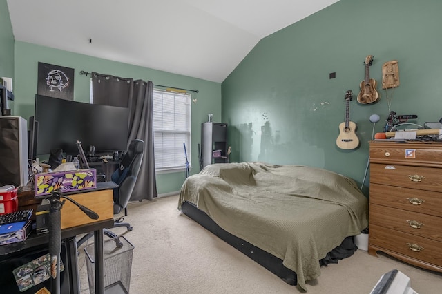 bedroom featuring carpet flooring and lofted ceiling