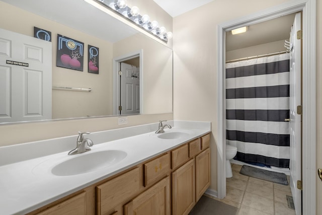 bathroom featuring tile patterned flooring, vanity, toilet, and a shower with shower curtain