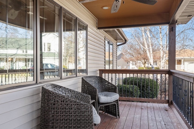 wooden terrace with ceiling fan